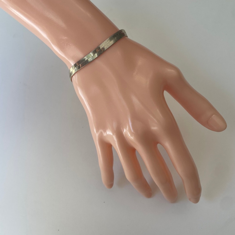 Revlon Vintage Gold Tone Herringbone Chain Bracelet Wavy Texture Flat Link 7.25"